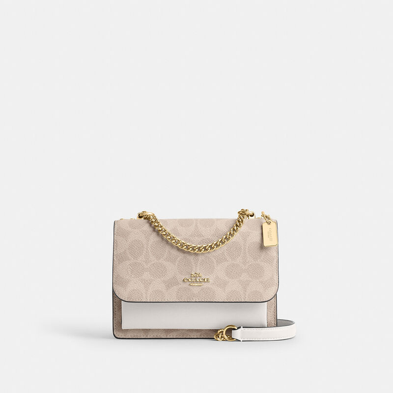 Mini Klare Crossbody Bag In Signature Canvas