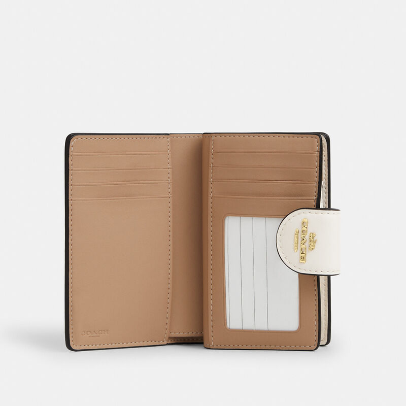 Medium Corner Zip Wallet In Signature Canvas