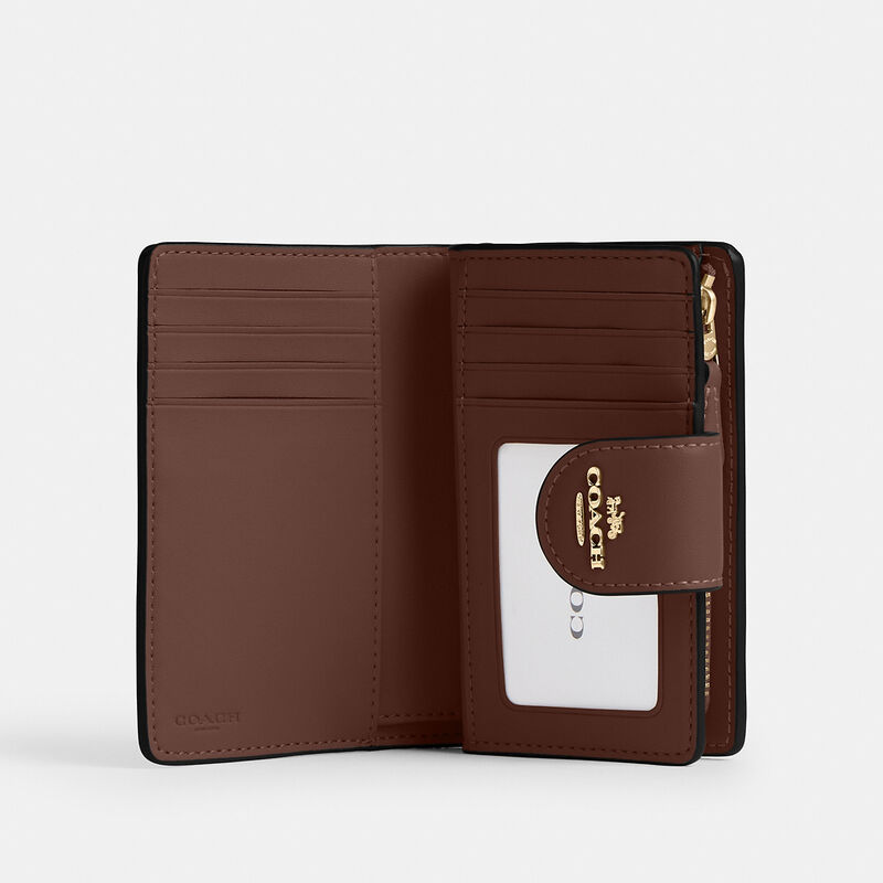 Medium Corner Zip Wallet In Signature Canvas