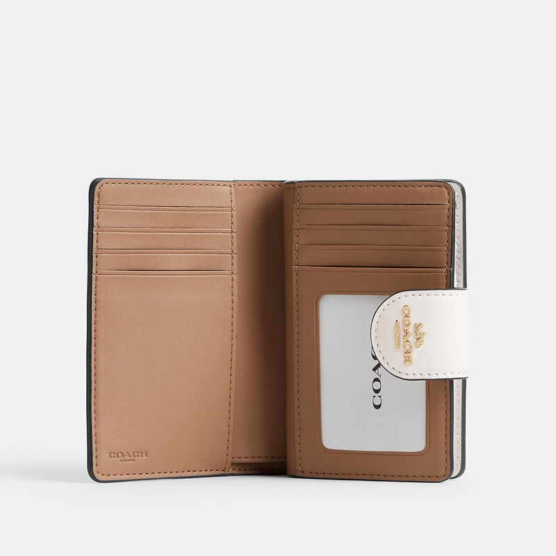 Medium Corner Zip Wallet In Signature Canvas
