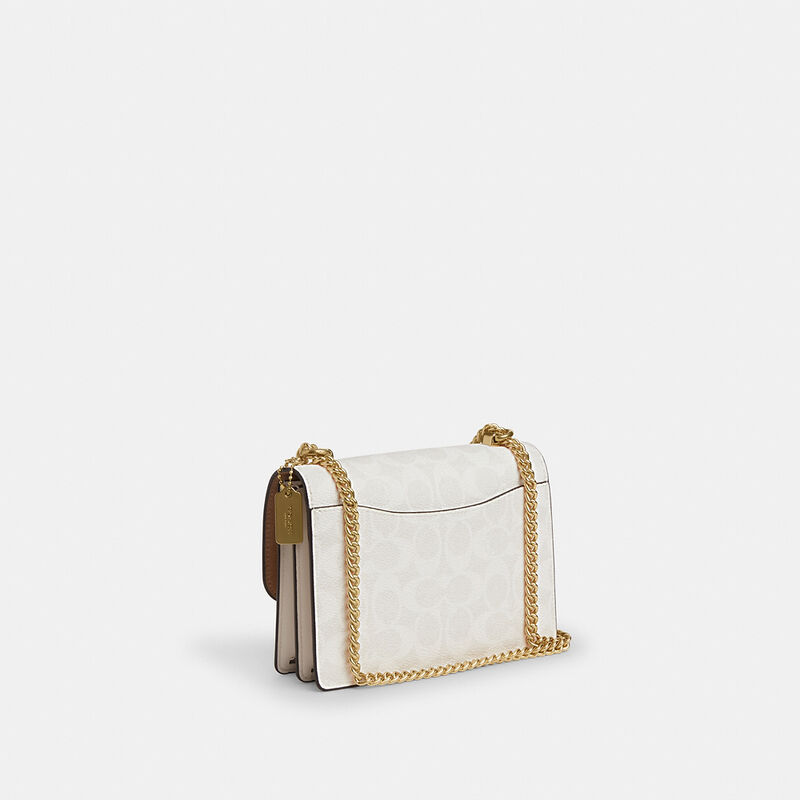 Mini Klare Crossbody Bag In Signature Canvas